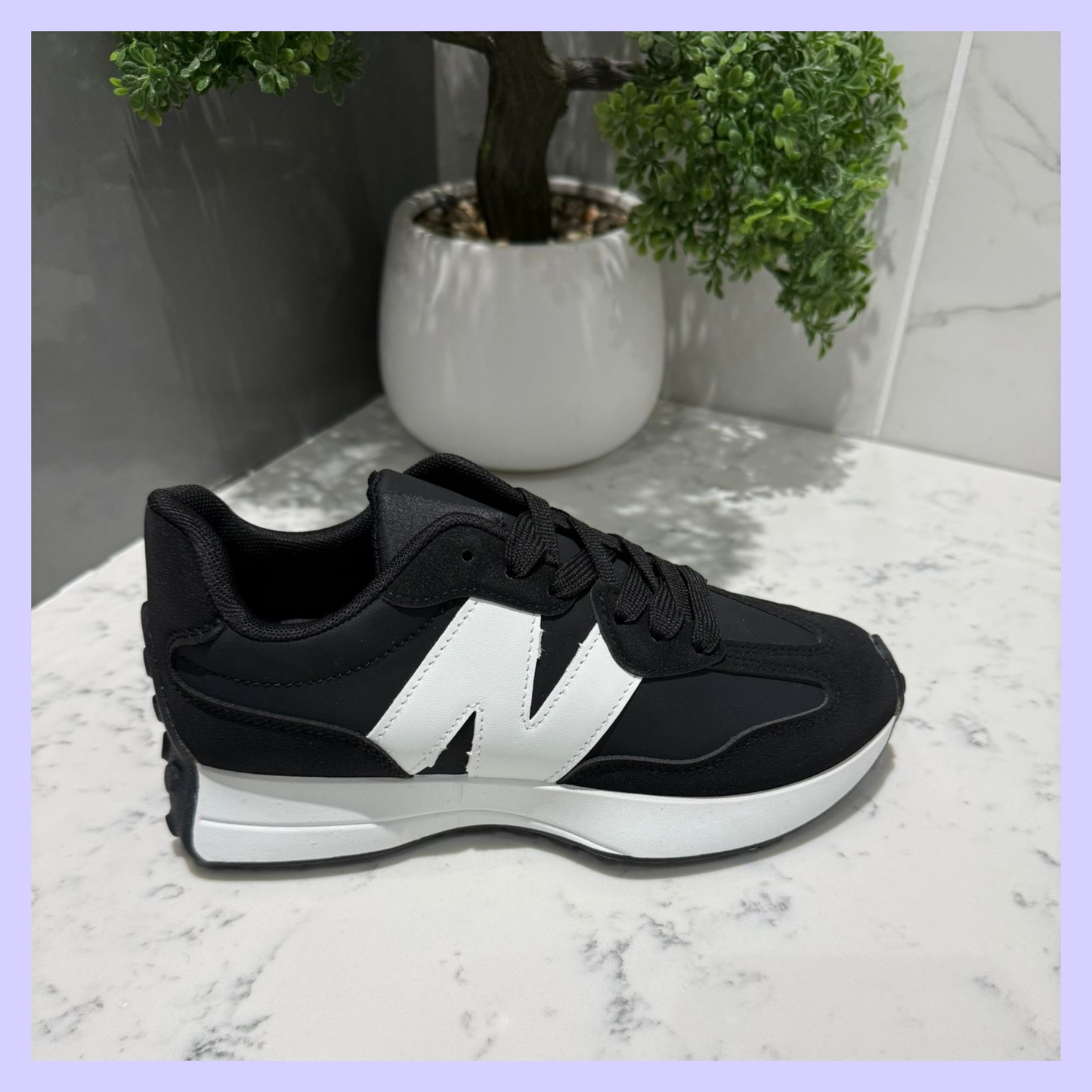 NINA BLACK / WHITE TRAINER